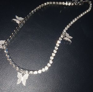 Necklace and earrings.